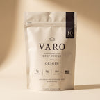 ORIGIN bag of VARO slow-fermented beef sticks on a cream backdrop